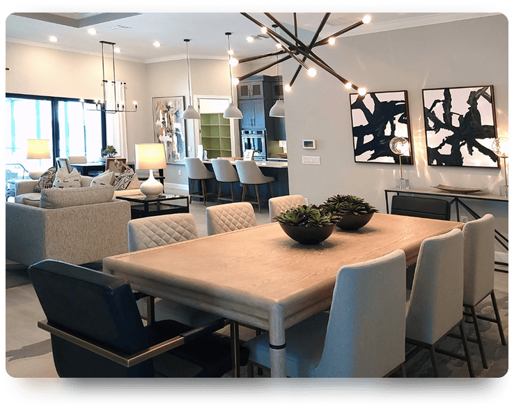 Modern open-concept dining and living area with a large wooden table | Blue Rock Roofing & Construction | Best roofing and construction in Fort Mill, SC